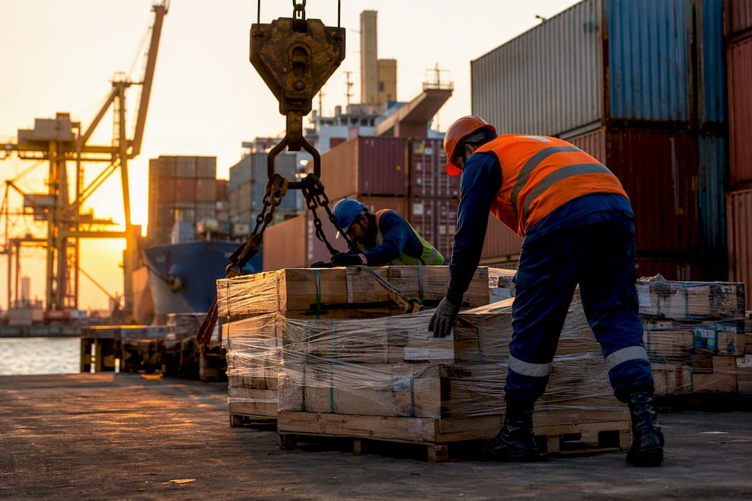 Forklift moving cargo at export customs area